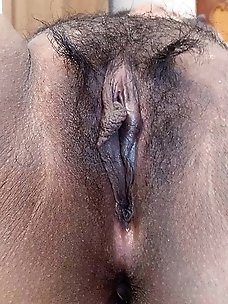 Sexiest asian MILF is spreading her pussy lips on pics
